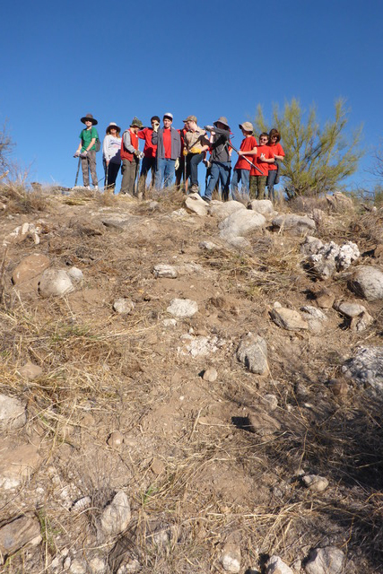 The Catalina State Park Buffel Slayers group at the top of a cleared hill